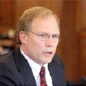 Daniel Johnston testifying before Alaskan Legislature during gas pipeline negotiations in 2006